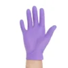 Close-up of O&M Halyard Purple Nitrile Exam Gloves 55080 series, showcasing the textured fingertips and durable material.